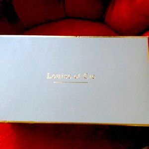 Red shoes by Louise et Cie